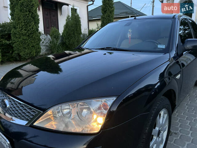 Черный Форд Мондео, объемом двигателя 1.8 л и пробегом 293 тыс. км за 4700 $, фото 7 на Automoto.ua