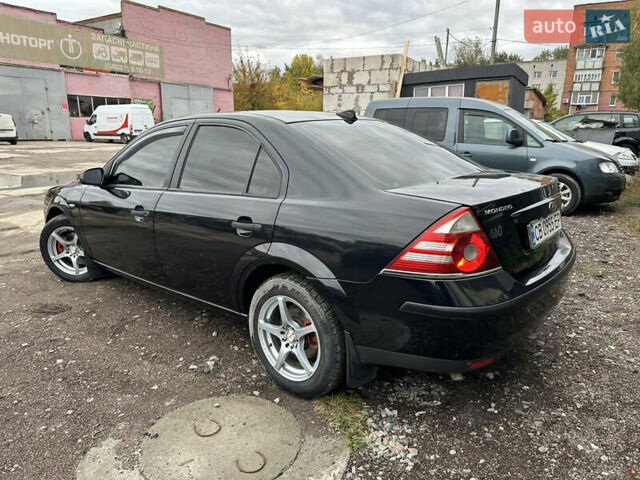 Черный Форд Мондео, объемом двигателя 1.8 л и пробегом 313 тыс. км за 5200 $, фото 12 на Automoto.ua