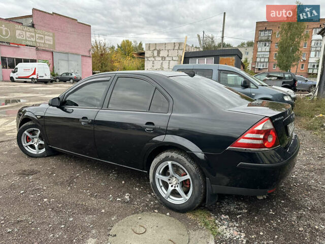 Черный Форд Мондео, объемом двигателя 1.8 л и пробегом 313 тыс. км за 5200 $, фото 13 на Automoto.ua