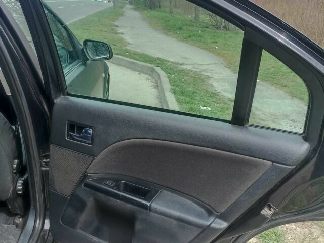 Чорний Форд Мондео, об'ємом двигуна 2 л та пробігом 270 тис. км за 4199 $, фото 1 на Automoto.ua