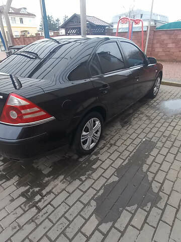 Черный Форд Мондео, объемом двигателя 2 л и пробегом 236 тыс. км за 5400 $, фото 23 на Automoto.ua