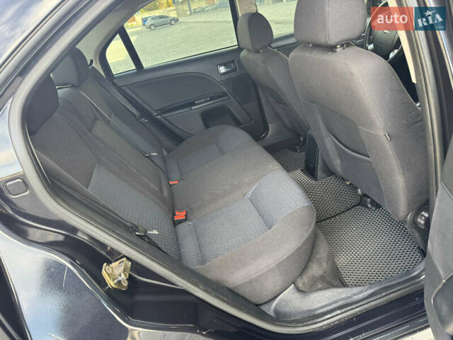 Форд Мондео 2006 в Днепре (Днепропетровске) на Automoto.ua Черный Форд Мондео, объемом двигателя 2 л и пробегом 260 тыс. км за 4700 $, фото 11 на Automoto.ua