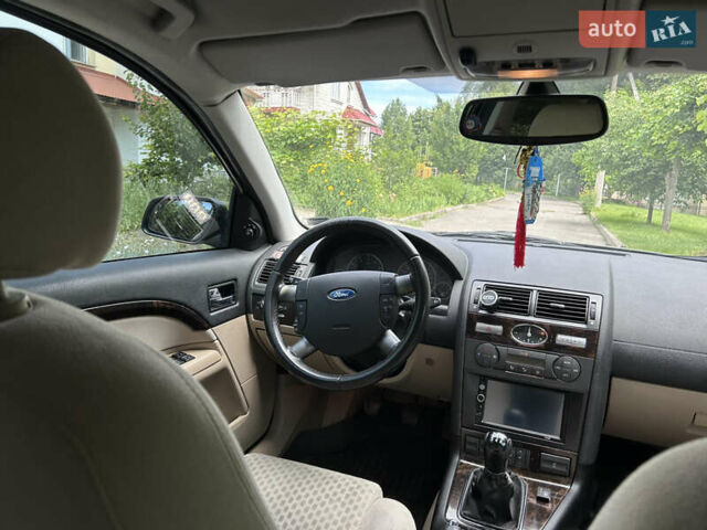 Черный Форд Мондео, объемом двигателя 1.8 л и пробегом 293 тыс. км за 4700 $, фото 29 на Automoto.ua