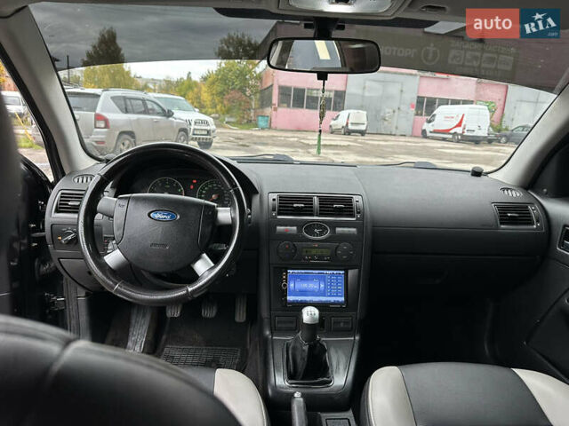 Черный Форд Мондео, объемом двигателя 1.8 л и пробегом 313 тыс. км за 5200 $, фото 28 на Automoto.ua