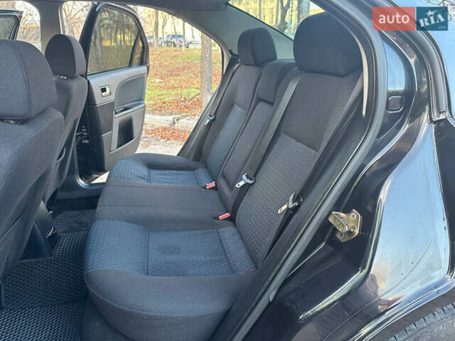 Черный Форд Мондео, объемом двигателя 2 л и пробегом 260 тыс. км за 4799 $, фото 26 на Automoto.ua