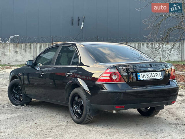 Черный Форд Мондео, объемом двигателя 2 л и пробегом 260 тыс. км за 4799 $, фото 8 на Automoto.ua