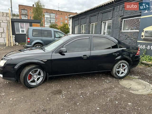 Черный Форд Мондео, объемом двигателя 1.8 л и пробегом 313 тыс. км за 5200 $, фото 16 на Automoto.ua