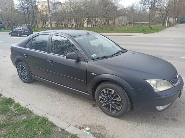 Чорний Форд Мондео, об'ємом двигуна 2 л та пробігом 270 тис. км за 4199 $, фото 4 на Automoto.ua