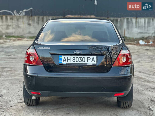 Черный Форд Мондео, объемом двигателя 2 л и пробегом 260 тыс. км за 4799 $, фото 6 на Automoto.ua