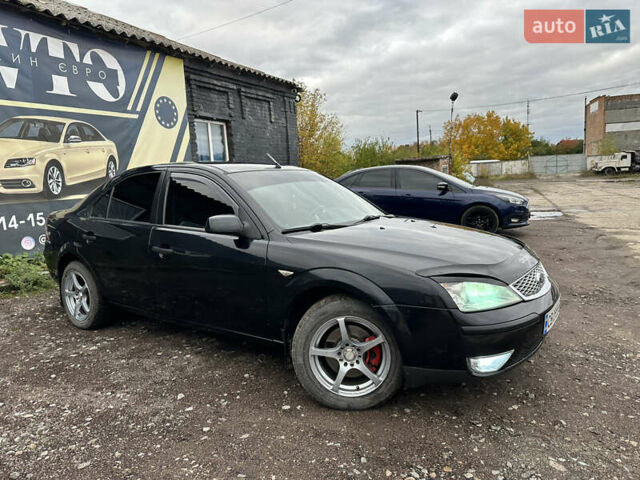 Черный Форд Мондео, объемом двигателя 1.8 л и пробегом 313 тыс. км за 5200 $, фото 4 на Automoto.ua