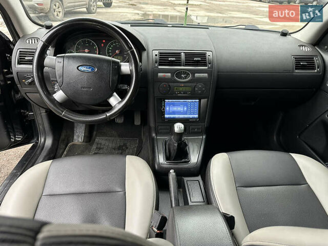 Черный Форд Мондео, объемом двигателя 1.8 л и пробегом 313 тыс. км за 5200 $, фото 29 на Automoto.ua