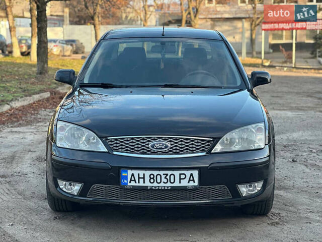 Черный Форд Мондео, объемом двигателя 2 л и пробегом 260 тыс. км за 4799 $, фото 2 на Automoto.ua