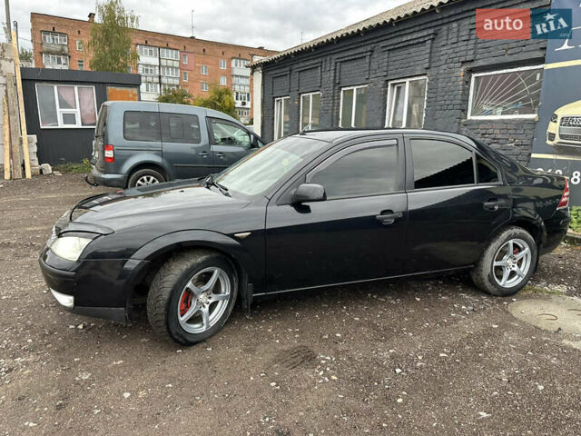 Черный Форд Мондео, объемом двигателя 1.8 л и пробегом 313 тыс. км за 5200 $, фото 17 на Automoto.ua