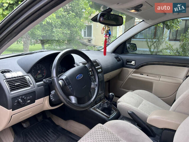 Черный Форд Мондео, объемом двигателя 1.8 л и пробегом 293 тыс. км за 4700 $, фото 27 на Automoto.ua