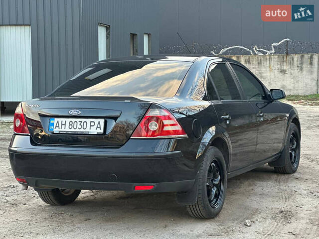 Черный Форд Мондео, объемом двигателя 2 л и пробегом 260 тыс. км за 4799 $, фото 5 на Automoto.ua