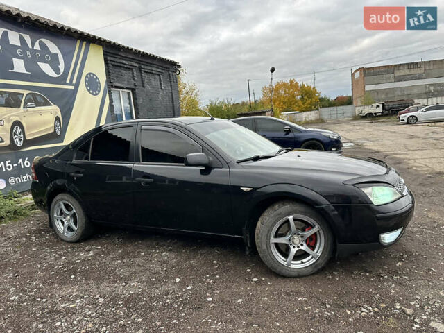 Черный Форд Мондео, объемом двигателя 1.8 л и пробегом 313 тыс. км за 5200 $, фото 5 на Automoto.ua