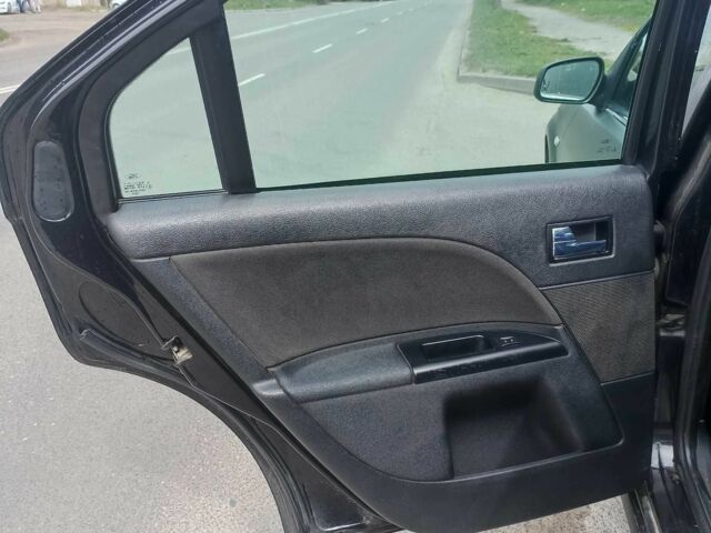 Чорний Форд Мондео, об'ємом двигуна 2 л та пробігом 270 тис. км за 4199 $, фото 3 на Automoto.ua