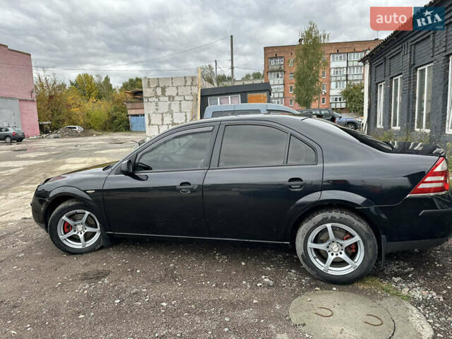 Черный Форд Мондео, объемом двигателя 1.8 л и пробегом 313 тыс. км за 5200 $, фото 15 на Automoto.ua