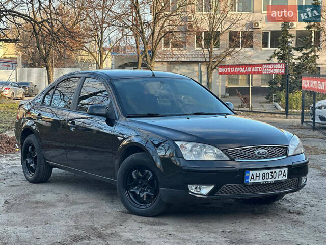 Черный Форд Мондео, объемом двигателя 2 л и пробегом 260 тыс. км за 4799 $, фото 1 на Automoto.ua