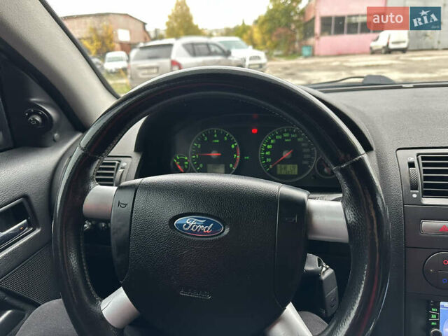 Черный Форд Мондео, объемом двигателя 1.8 л и пробегом 313 тыс. км за 5200 $, фото 23 на Automoto.ua