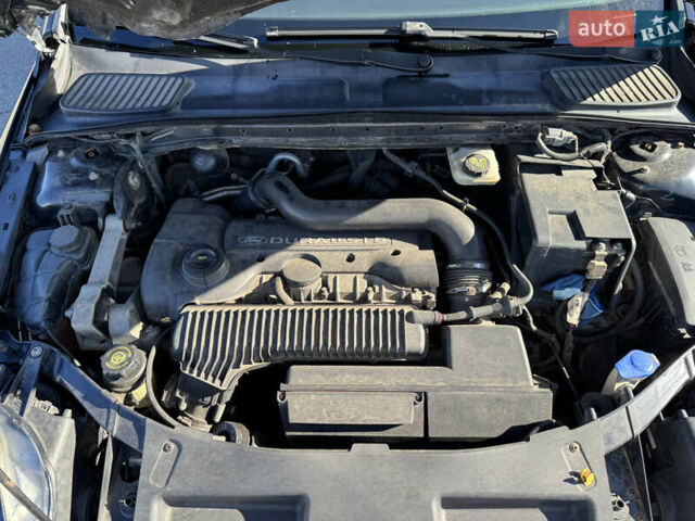 Черный Форд Мондео, объемом двигателя 2.5 л и пробегом 207 тыс. км за 6500 $, фото 13 на Automoto.ua