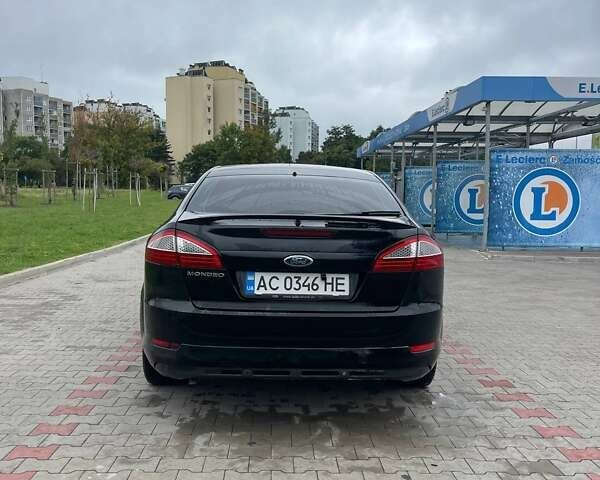 Черный Форд Мондео, объемом двигателя 2 л и пробегом 165 тыс. км за 7000 $, фото 2 на Automoto.ua