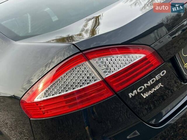 Черный Форд Мондео, объемом двигателя 1.8 л и пробегом 225 тыс. км за 6800 $, фото 10 на Automoto.ua