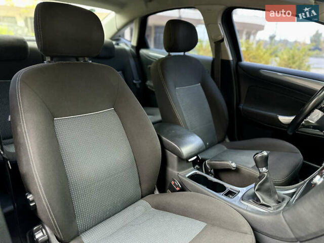 Черный Форд Мондео, объемом двигателя 2 л и пробегом 330 тыс. км за 7190 $, фото 30 на Automoto.ua