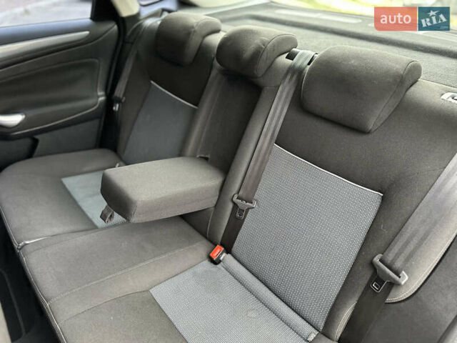 Черный Форд Мондео, объемом двигателя 2 л и пробегом 330 тыс. км за 7190 $, фото 32 на Automoto.ua