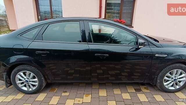 Черный Форд Мондео, объемом двигателя 2 л и пробегом 280 тыс. км за 8700 $, фото 3 на Automoto.ua