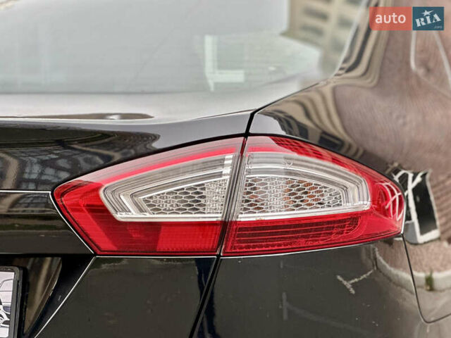 Черный Форд Мондео, объемом двигателя 2 л и пробегом 330 тыс. км за 7190 $, фото 11 на Automoto.ua