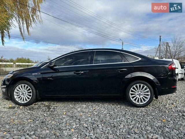 Чорний Форд Мондео, об'ємом двигуна 2 л та пробігом 292 тис. км за 7300 $, фото 6 на Automoto.ua