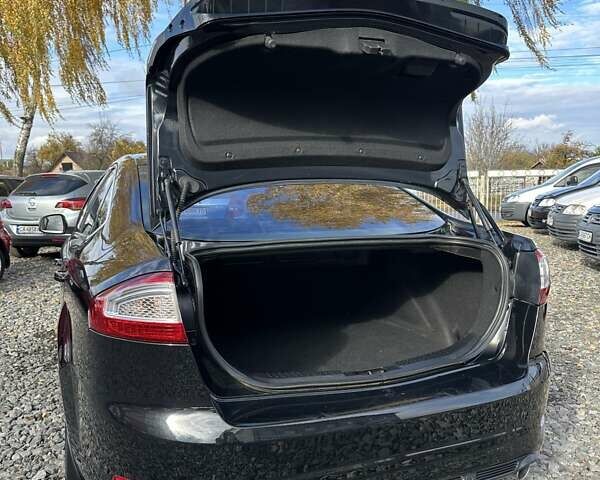 Чорний Форд Мондео, об'ємом двигуна 2 л та пробігом 292 тис. км за 7300 $, фото 16 на Automoto.ua