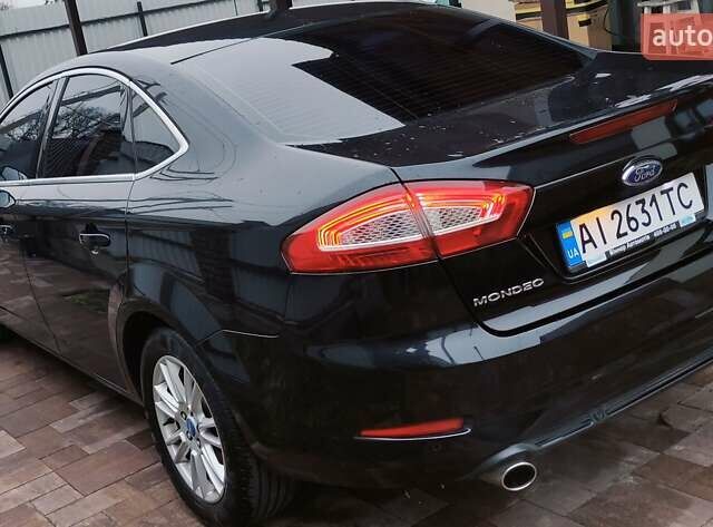 Черный Форд Мондео, объемом двигателя 2 л и пробегом 162 тыс. км за 8700 $, фото 10 на Automoto.ua