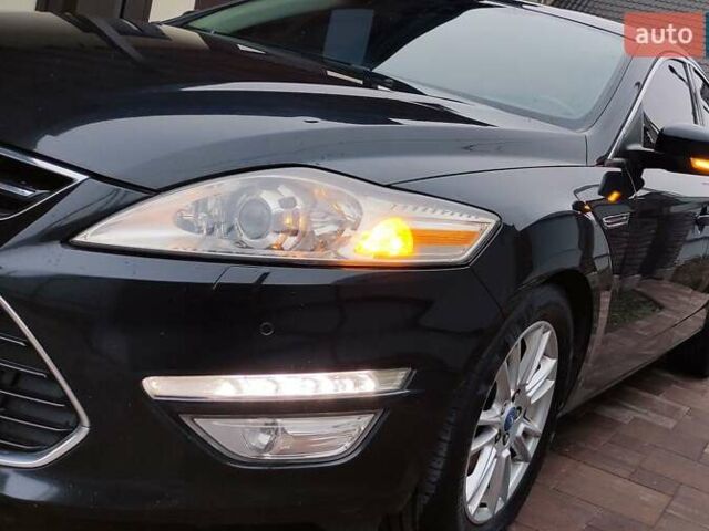 Черный Форд Мондео, объемом двигателя 2 л и пробегом 162 тыс. км за 8700 $, фото 4 на Automoto.ua