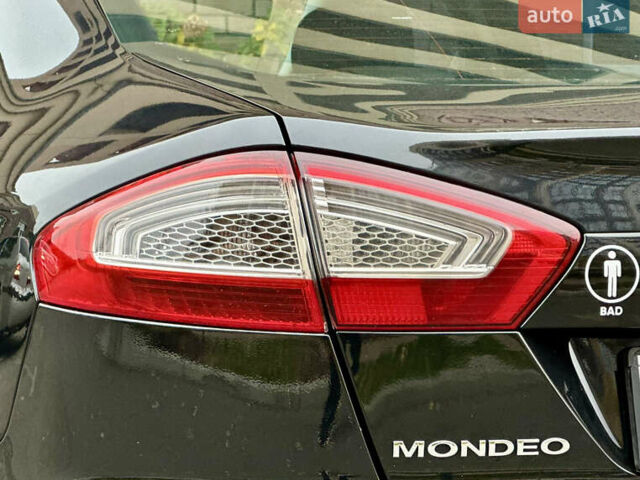 Черный Форд Мондео, объемом двигателя 2 л и пробегом 330 тыс. км за 7190 $, фото 10 на Automoto.ua