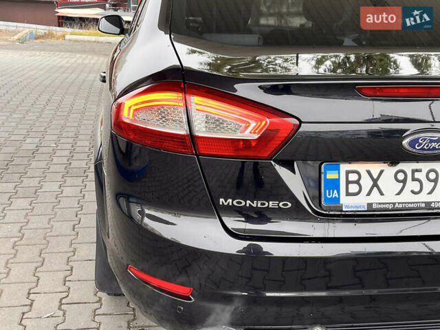 Черный Форд Мондео, объемом двигателя 2 л и пробегом 206 тыс. км за 8900 $, фото 41 на Automoto.ua