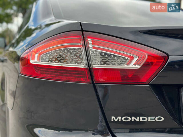 Черный Форд Мондео, объемом двигателя 2 л и пробегом 80 тыс. км за 8888 $, фото 24 на Automoto.ua