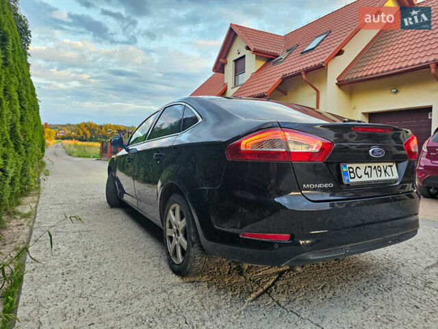 Черный Форд Мондео, объемом двигателя 2 л и пробегом 207 тыс. км за 5600 $, фото 5 на Automoto.ua