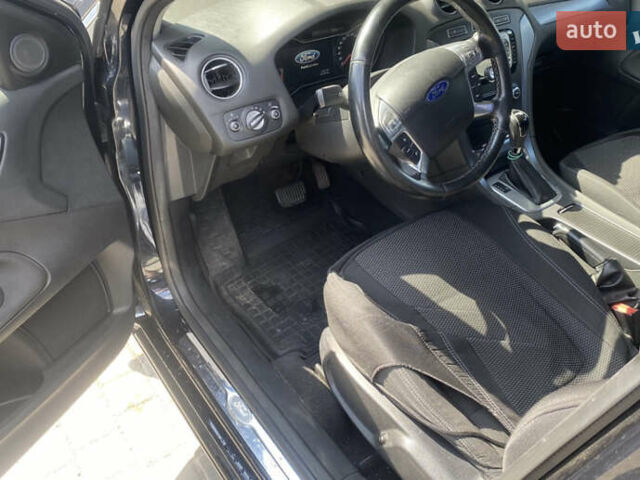 Черный Форд Мондео, объемом двигателя 2 л и пробегом 144 тыс. км за 8500 $, фото 7 на Automoto.ua