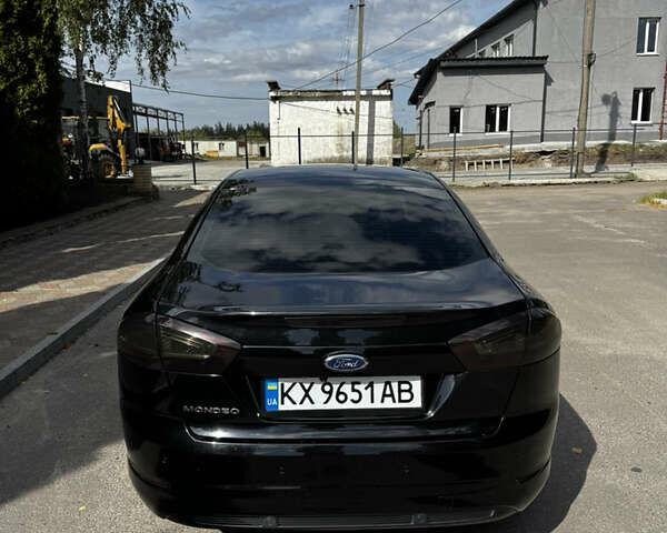 Черный Форд Мондео, объемом двигателя 1.6 л и пробегом 150 тыс. км за 7000 $, фото 5 на Automoto.ua