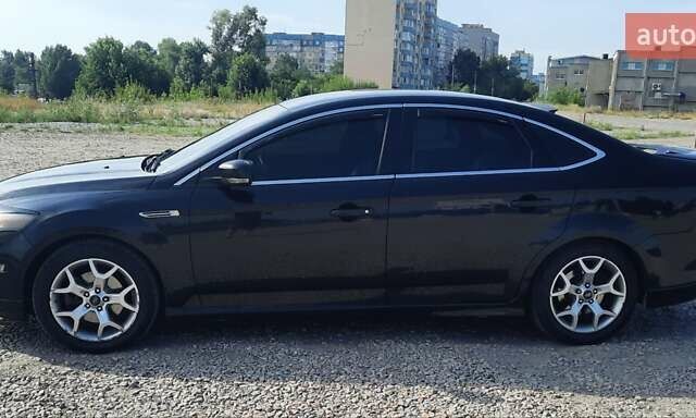 Чорний Форд Мондео, об'ємом двигуна 2 л та пробігом 176 тис. км за 10500 $, фото 2 на Automoto.ua