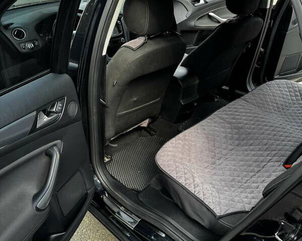 Черный Форд Мондео, объемом двигателя 1.6 л и пробегом 150 тыс. км за 7000 $, фото 19 на Automoto.ua