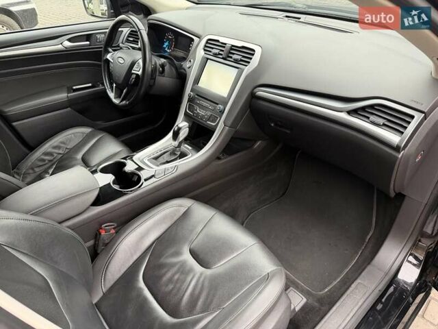 Черный Форд Мондео, объемом двигателя 2 л и пробегом 170 тыс. км за 8700 $, фото 44 на Automoto.ua