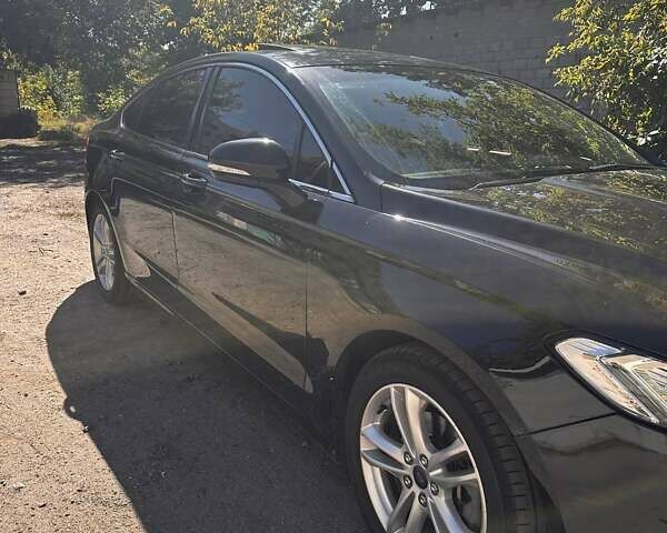 Чорний Форд Мондео, об'ємом двигуна 2 л та пробігом 195 тис. км за 12500 $, фото 20 на Automoto.ua