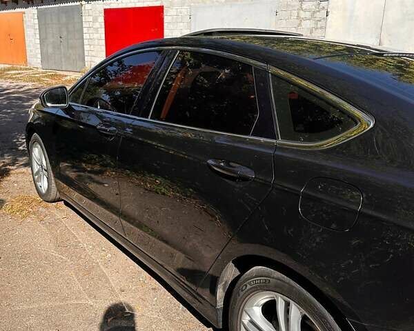 Чорний Форд Мондео, об'ємом двигуна 2 л та пробігом 195 тис. км за 12500 $, фото 7 на Automoto.ua