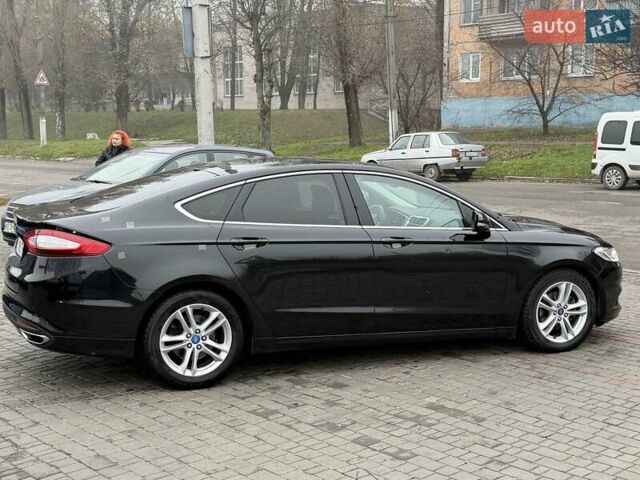 Черный Форд Мондео, объемом двигателя 2 л и пробегом 170 тыс. км за 8700 $, фото 24 на Automoto.ua