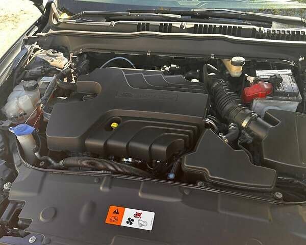 Чорний Форд Мондео, об'ємом двигуна 2 л та пробігом 195 тис. км за 12500 $, фото 16 на Automoto.ua