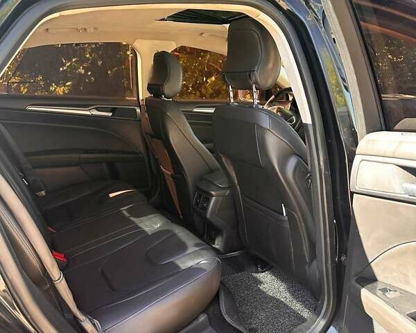 Чорний Форд Мондео, об'ємом двигуна 2 л та пробігом 195 тис. км за 12500 $, фото 14 на Automoto.ua