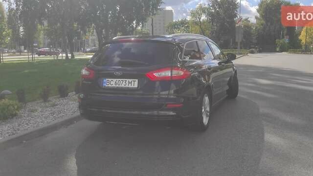 Черный Форд Мондео, объемом двигателя 2 л и пробегом 244 тыс. км за 12700 $, фото 5 на Automoto.ua